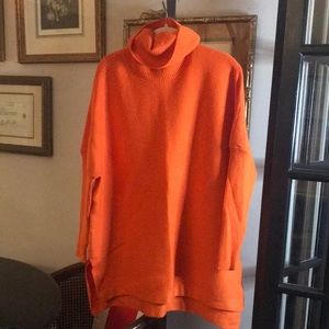 Orange turtleneck loose fit sweater